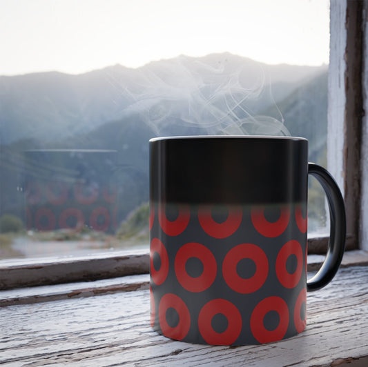 Black heat-reveal mug with red and blue Fishman donut pattern